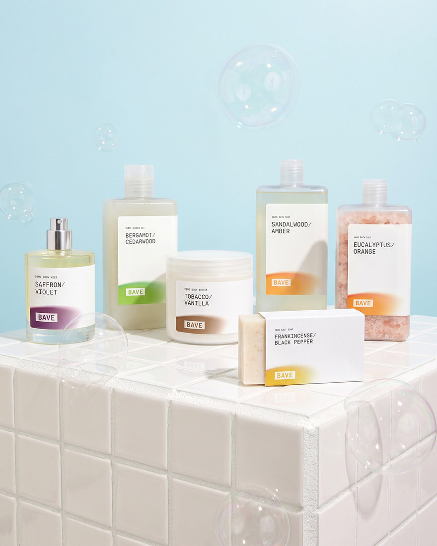 BAVE body care and fragrance products arranged on a tiled surface.